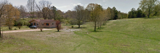 Large narrow property in a beautifully wooded area in Sardis