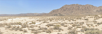 Gorgeous five acre property at the base of a stunning mountain range