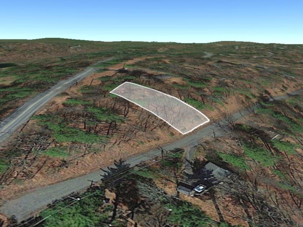 Over a quarter of an acre across the street from the lake1