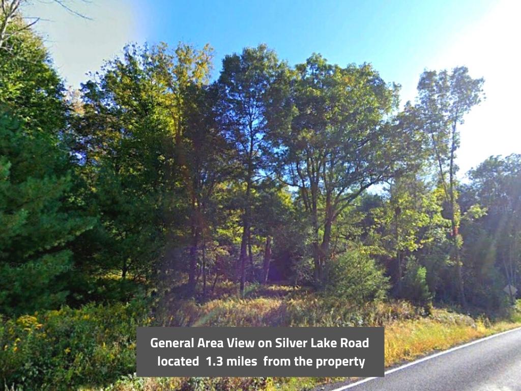 Over a quarter of an acre across the street from the lake1